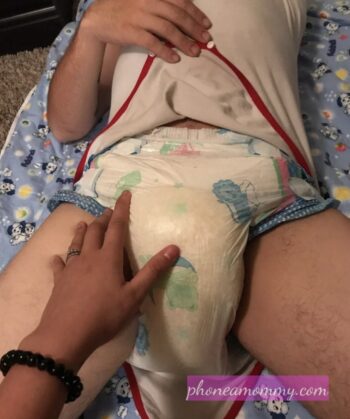 abdl enjoying his wet diaper